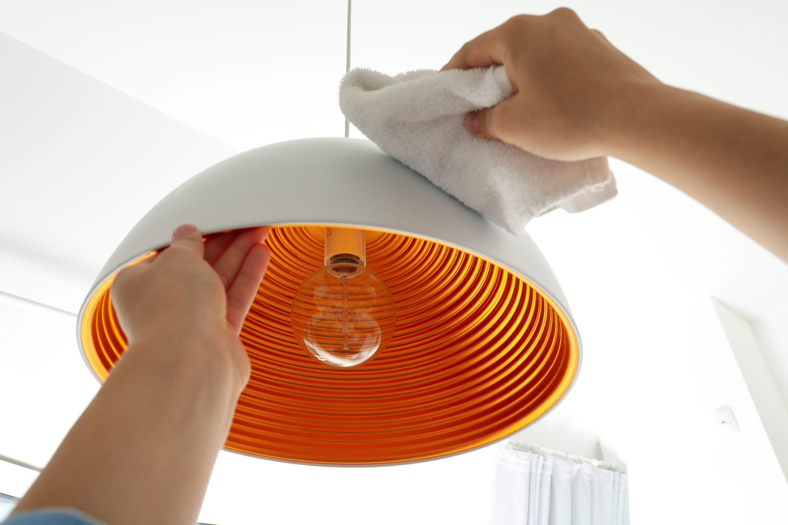 Property cleaning - chandelier dusting.